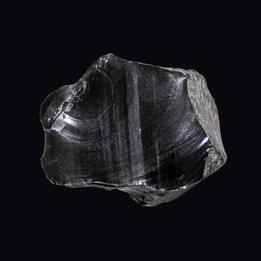 Black Obsidian, jet black and very dark brown-black volcanic glass mineral specimen