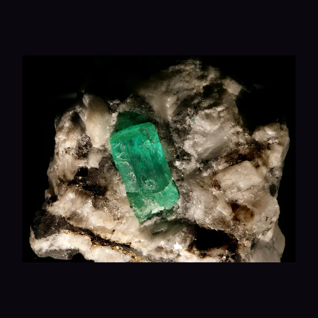 Emerald, deep grass green and blue-green silicate mineral specimen