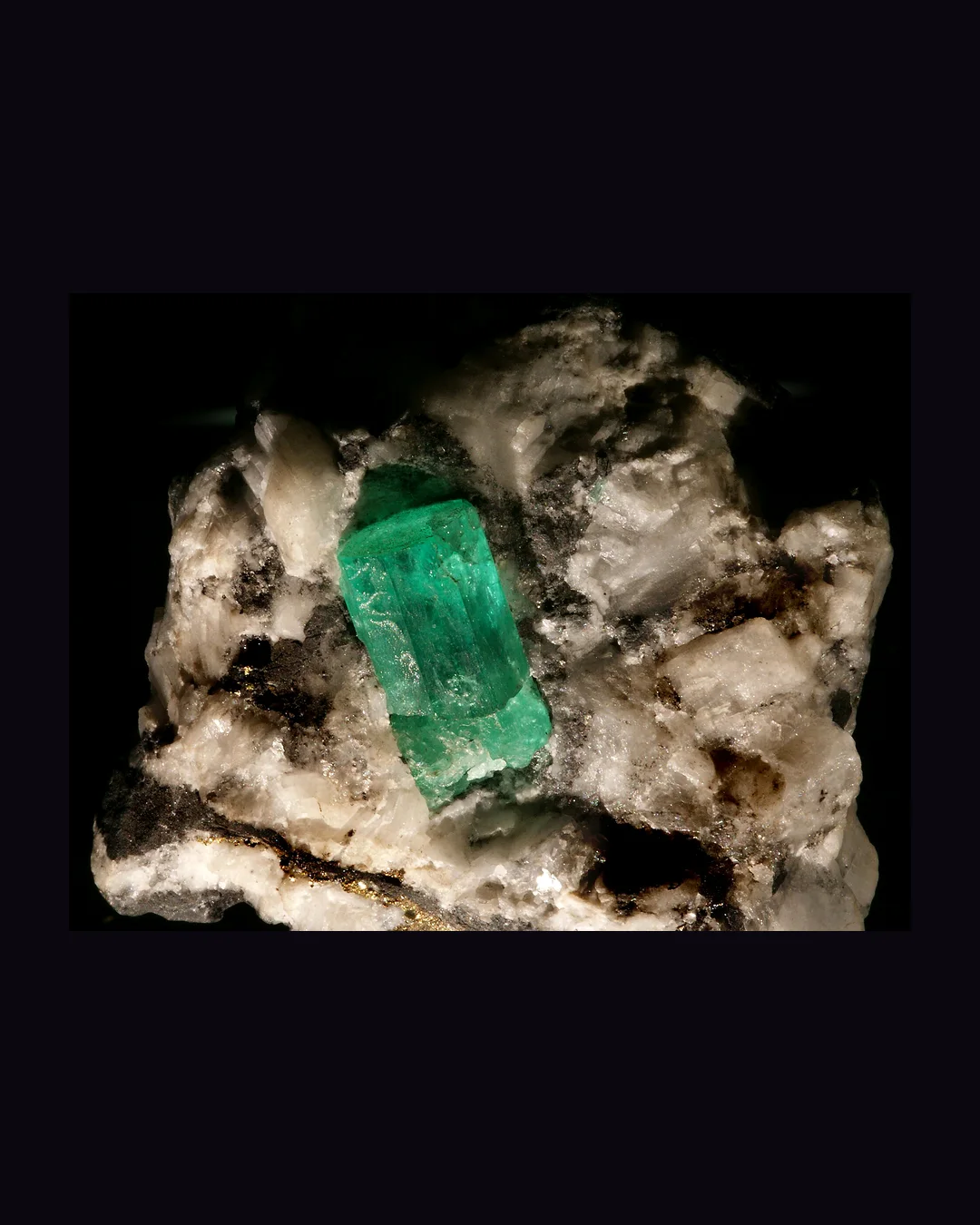 Emerald, deep grass green and blue-green silicate mineral specimen