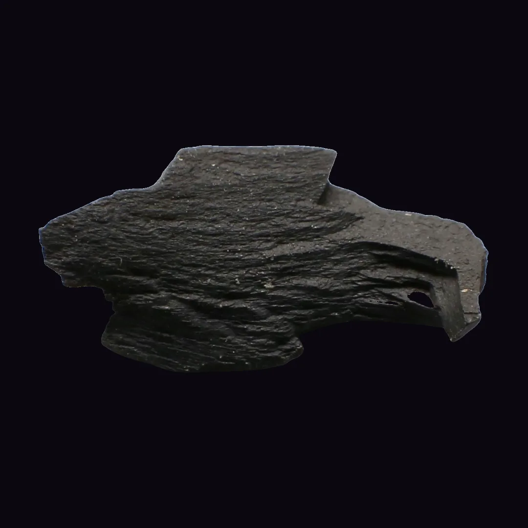 Jet, velvety black and very dark brown organic mineral specimen