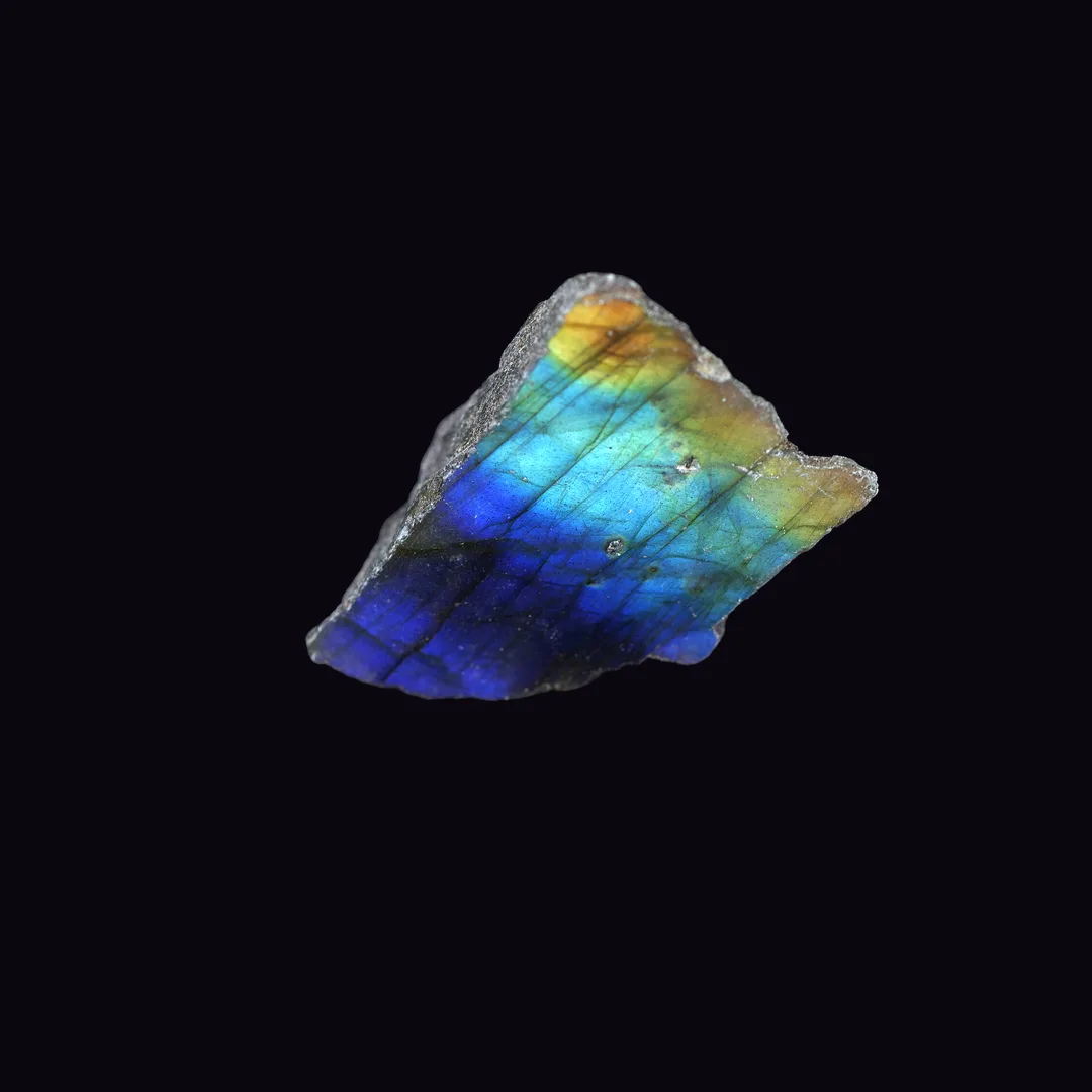 Labradorite, grey body with blue, green, gold, orange flash and smoky grey feldspar mineral specimen