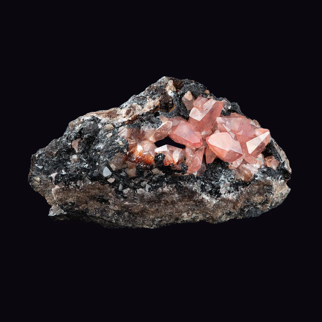 Rhodochrosite, rose pink and raspberry red carbonate mineral specimen