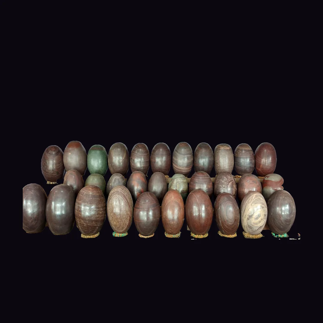 Shiva Lingam, tan and brown and grey with red-brown markings rock (aggregate) mineral specimen