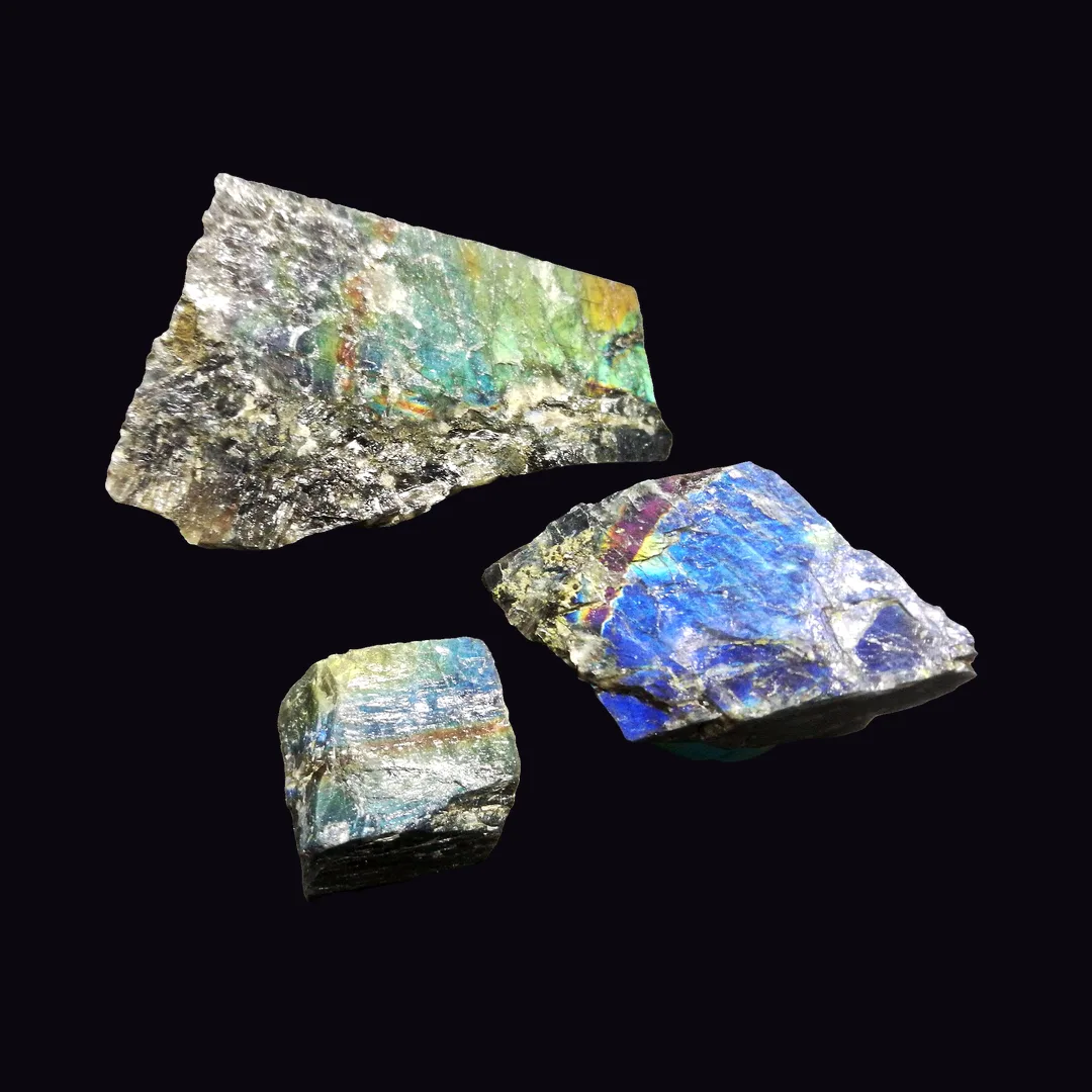 Spectrolite, near-black body with red, orange, gold, violet, green and blue flash feldspar mineral specimen