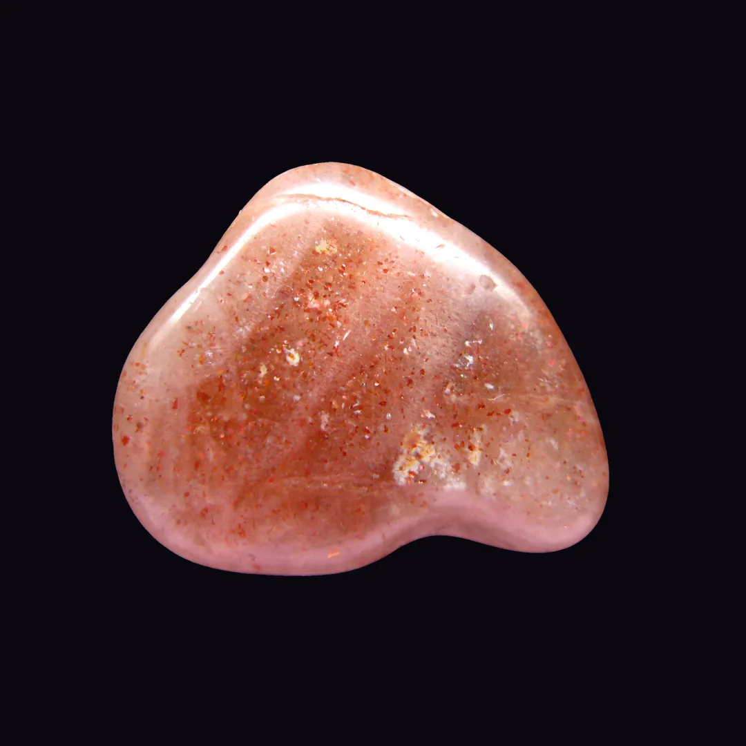 Sunstone, peach and orange feldspar mineral specimen