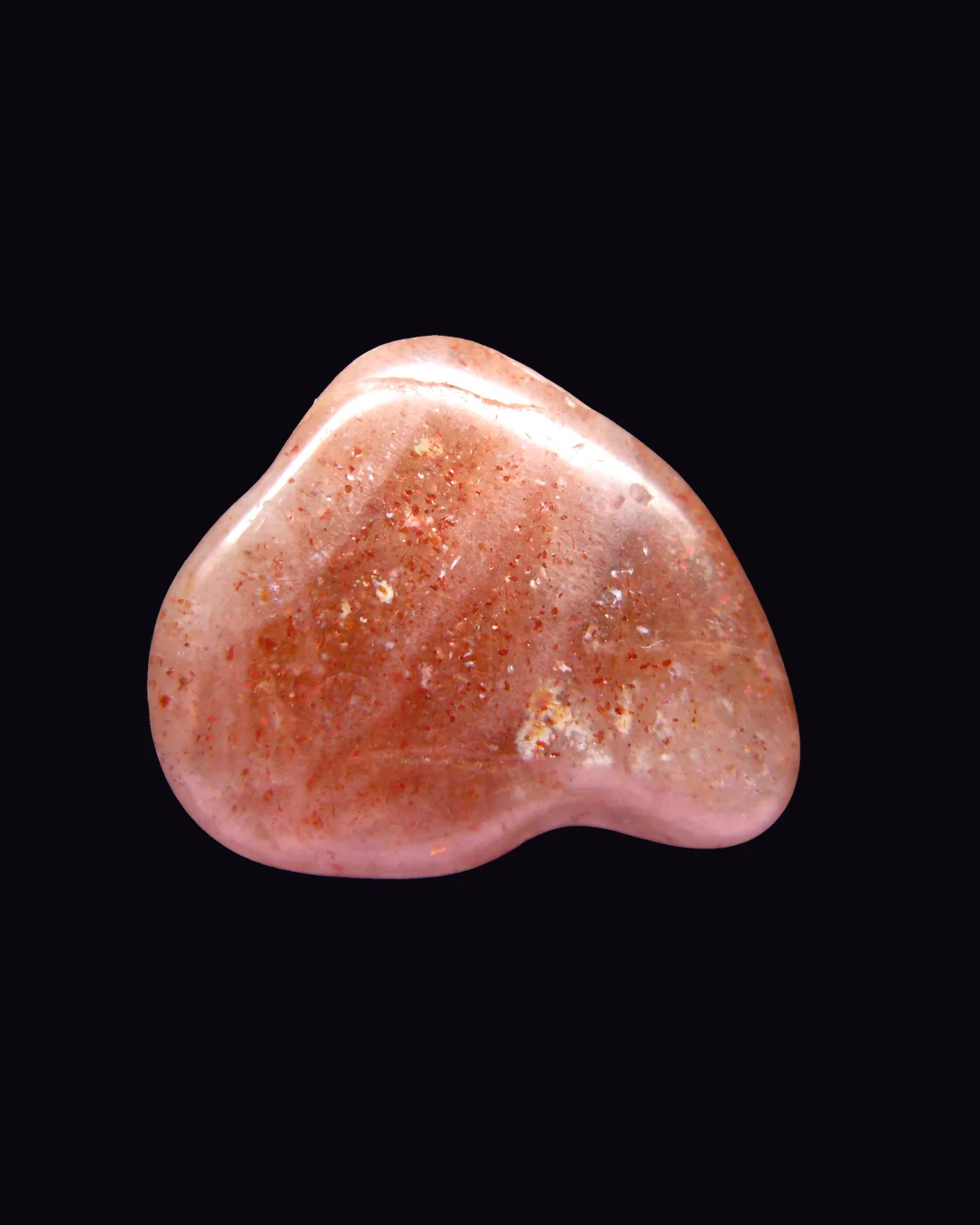 Sunstone, peach and orange feldspar mineral specimen